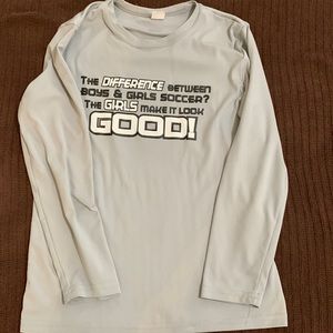 Gray long sleeve girls soccer shirt.